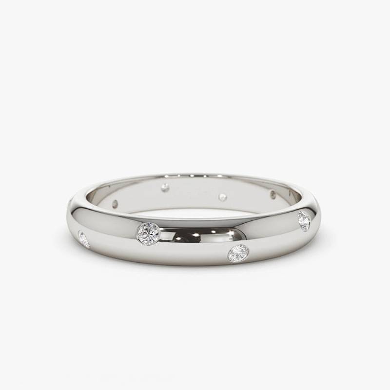 Our scattered diamond inlay ring makes an exceptional and unique wedding band, sterling silver