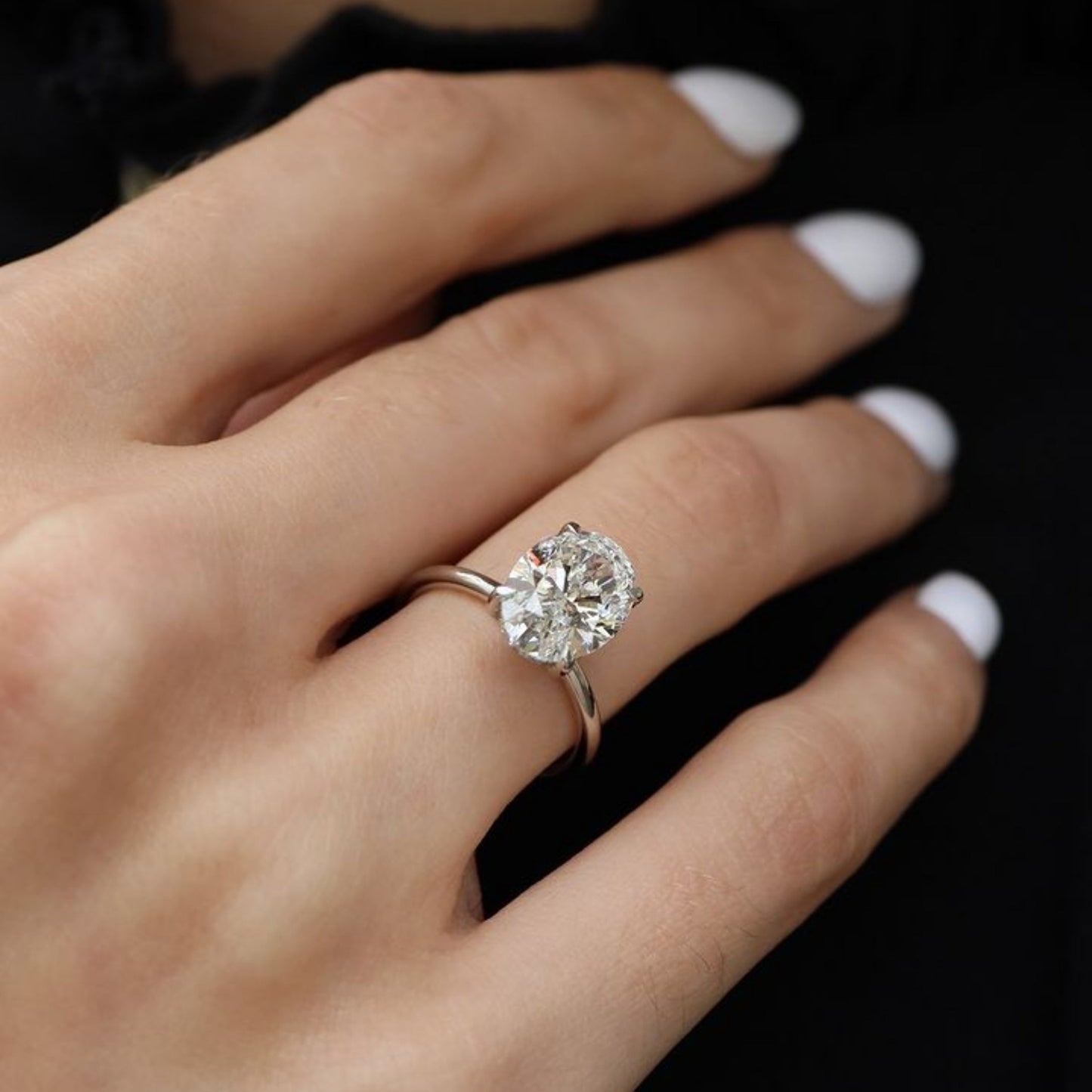 Kourtney Kardashian-inspired 6 Carat oval cut engagement ring with brilliant white lab-created gemstone, prong set in sterling silver
