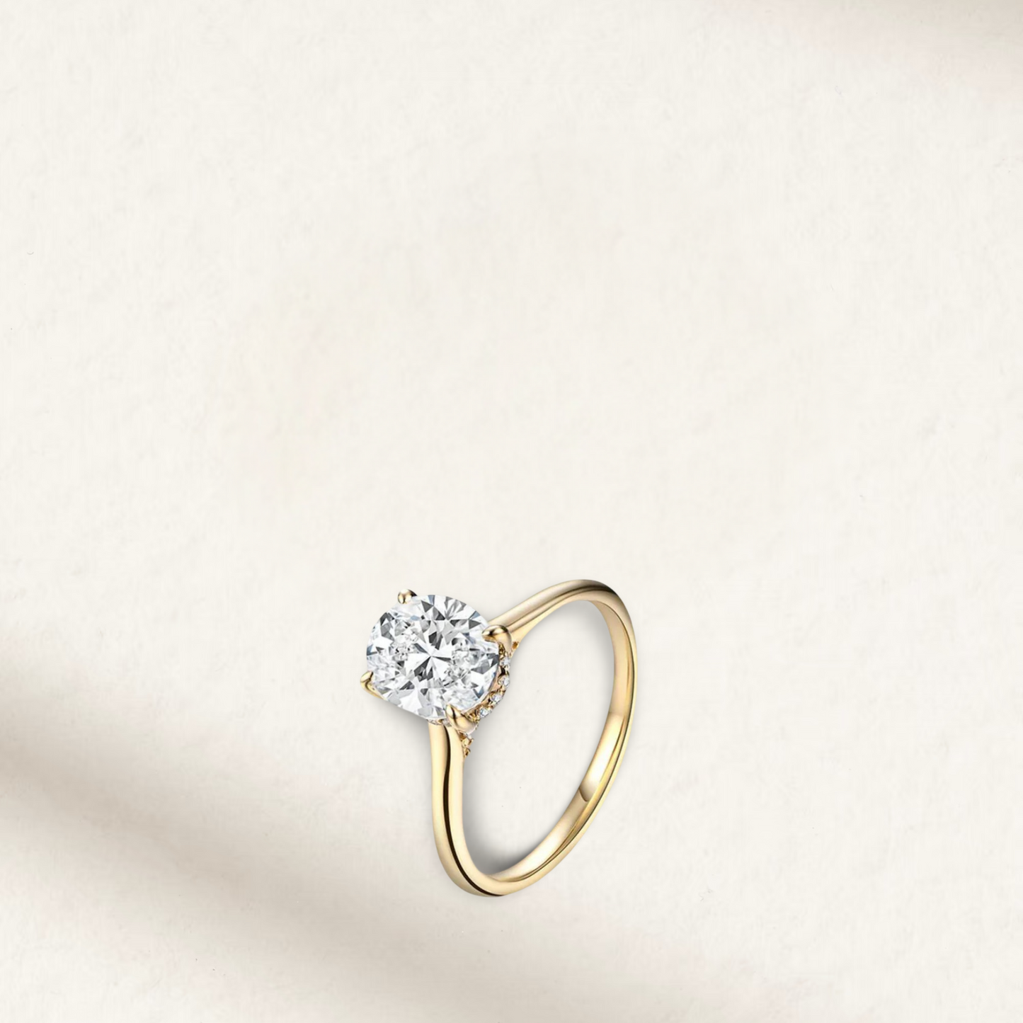 2 Carat Oval Cut Engagement Ring with Hidden Halo in yellow gold