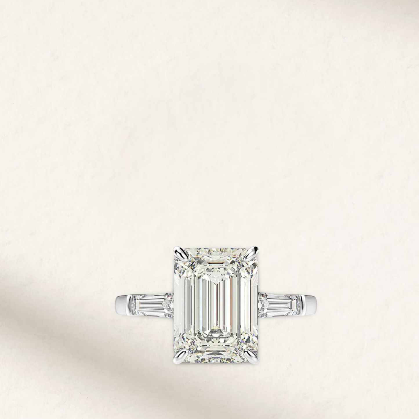 5 carat emerald cut engagement ring with white brilliant lab-created gemstone, set in sterling silver on classic prongs