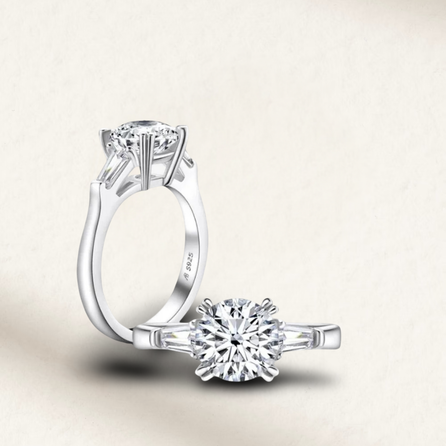 2 carat lab-made round cut three-stone engagement ring, featuring a classic design with a sterling silver setting.