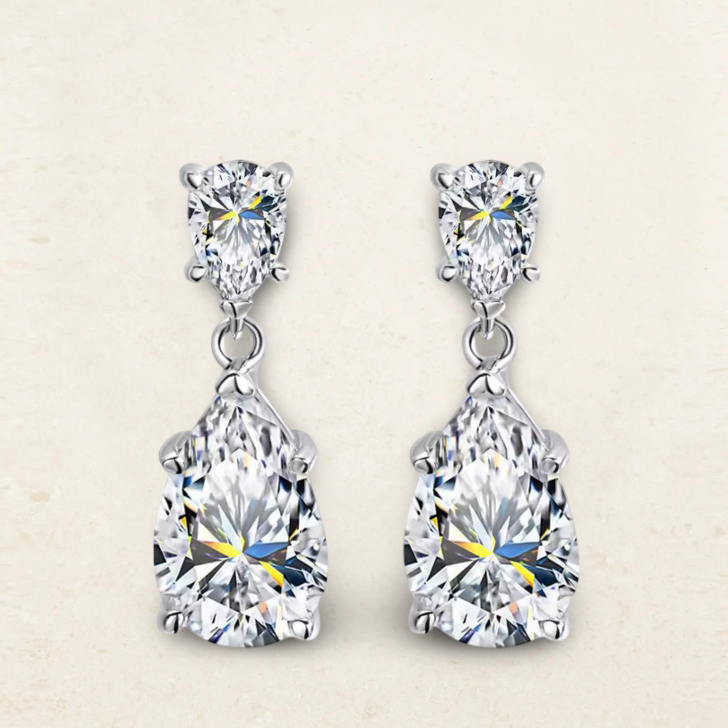 Sofia Richie-inspired pear-shaped waterdrop dangle earrings in a classic bridal design, perfect for weddings and formal occasions.