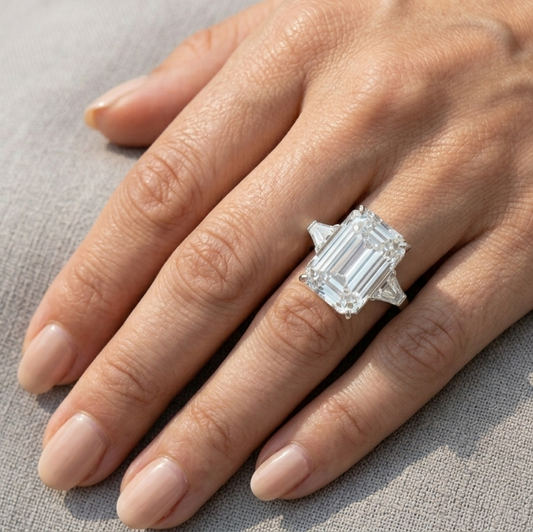 Kim Kardashian Emerald Cut Engagement Ring 10 Carats from Kris Humphries on a Sterling Silver Band 
