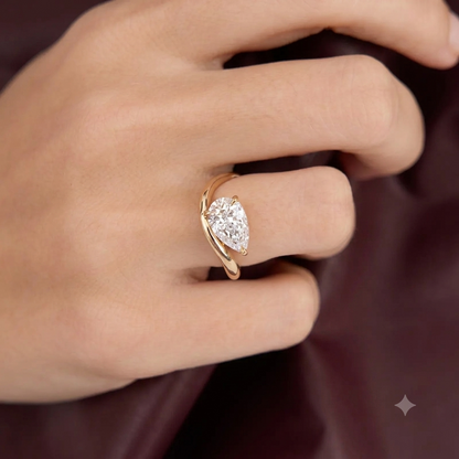2 Carat Pear Shape Ring on Wavy Yellow Gold Band 