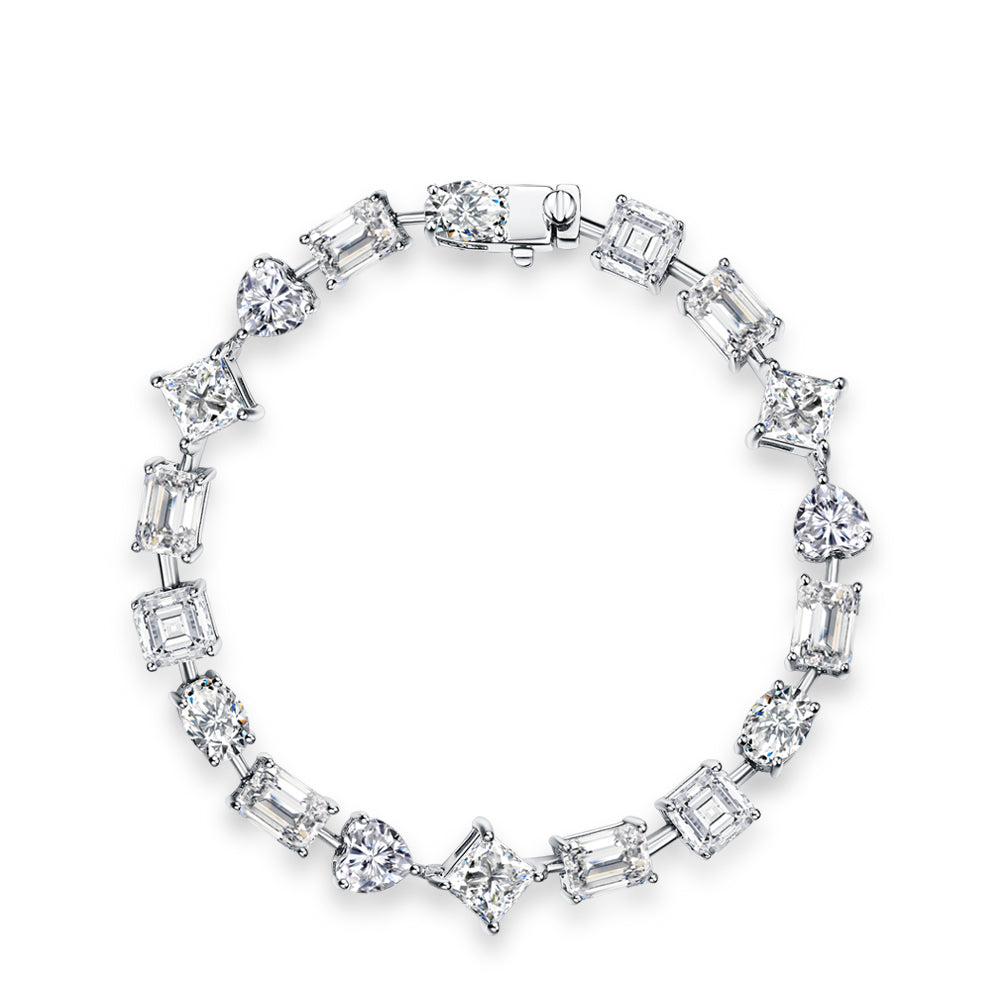 multi diamond shape wedding bracelet with asscher cut, princess cut, emerald cut and heart shape stones, met gala 2024 jewellery, sterling silver