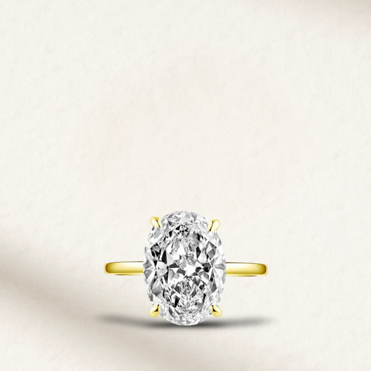 6 carat oval cut engagement ring dupe with gold band inspired by Jasmine Tookes
