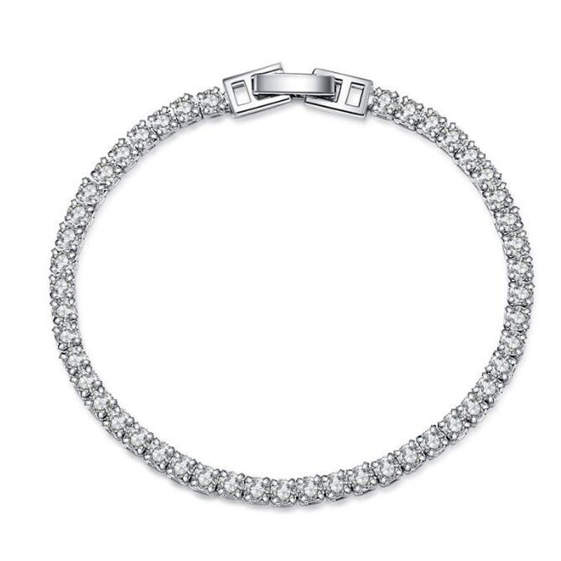 Our Silver Tennis Bracelet in 2.5mm stones is an elegant bridal, wedding day piece. This minimalist tennis bracelet can be worn alone or as a stackable bracelet to add to your existing bracelet stack. Tennis bracelets are a timeless choice for special occasions or as a gift for a loved one.&nbsp;