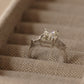 5 Carat Emerald Cut Engagement Ring with tapered baguettes on a 925 Sterling Silver band makes the perfect promise ring or proposal ring for her by margalit rings travel ring top view