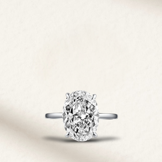 Kourtney Kardashian-inspired 6 Carat oval cut engagement ring with brilliant white lab-created gemstone, prong set in sterling silver

