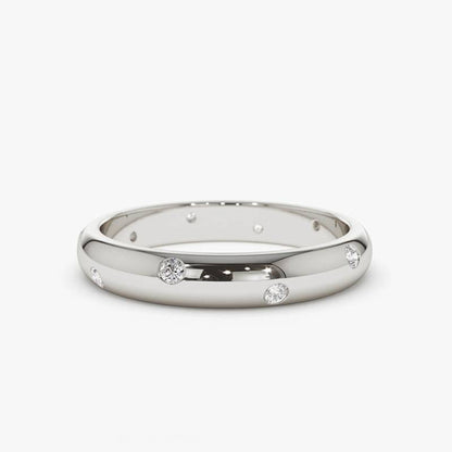 Our scattered diamond inlay ring makes an exceptional and unique wedding band, sterling silver