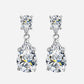 Sofia Richie inspired waterdrop pear cut dangle drop wedding earrings in 925 sterling silver, 7 carat total weight, shown on white background