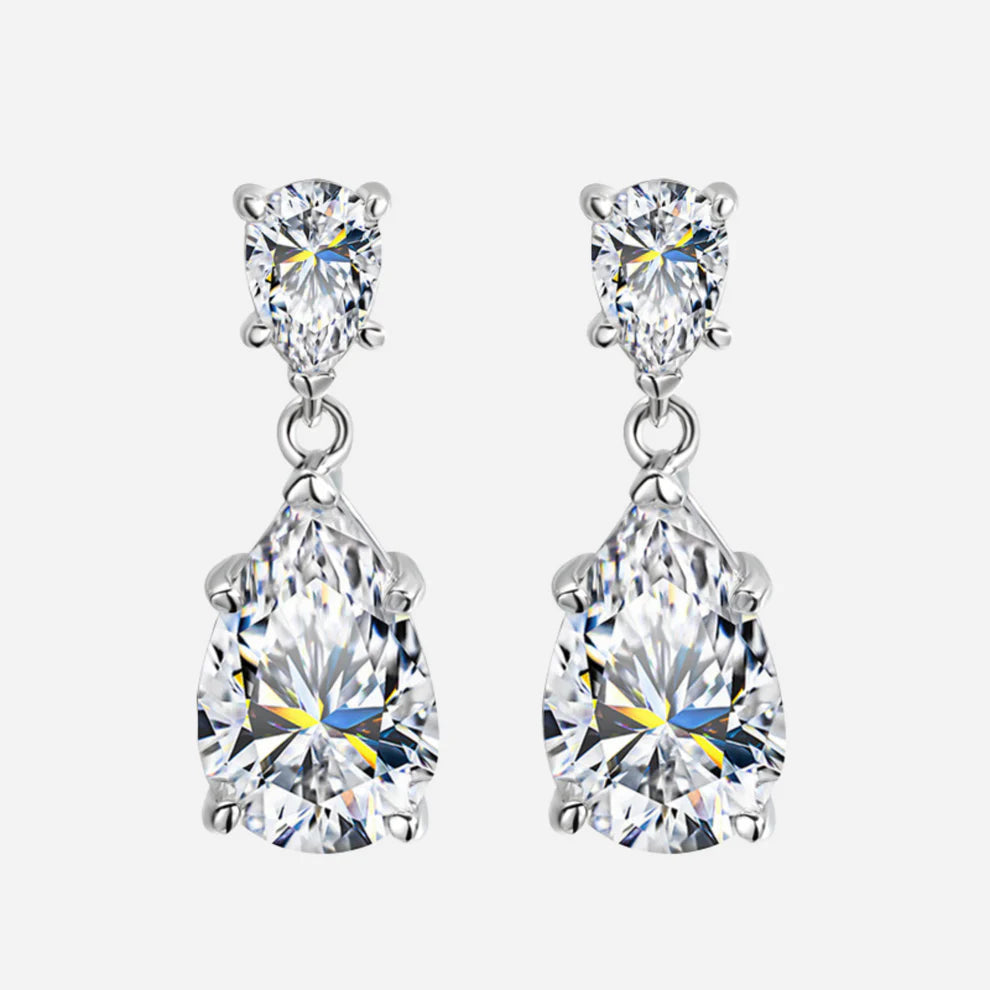 Sofia Richie inspired waterdrop pear cut dangle drop wedding earrings in 925 sterling silver, 7 carat total weight, shown on white background