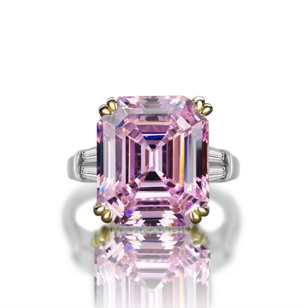 Our exceptional 9.52 Carat Fancy Pink Cut Engagement Ring with tapered baguettes and a hidden halo of micro pave under the centre stone makes the perfect promise ring or proposal ring for her by Margalit Rings