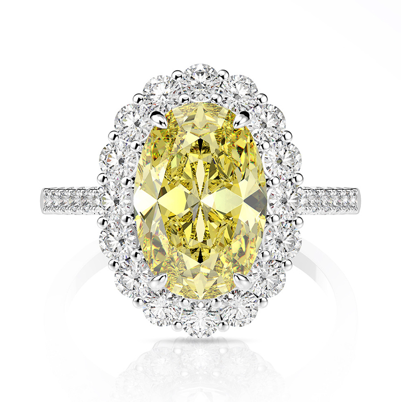 Oval Diamond Engagement Ring For Her. Our stunning coloured oval 5 carat oval shaped diamond look engagement ring on a double row of micro pave on the band with a hidden halo of micro pave around the centre stone. Perfect for proposals, engagement rings, or as a promise rings in yellow