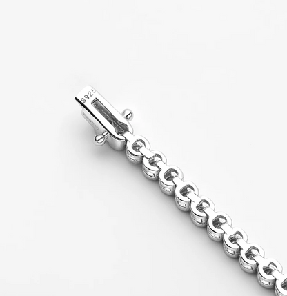 Our Bezel Set Silver Tennis Bracelet in 2mm stones is an elegant bridal, wedding day jewelry piece. This minimalist tennis bracelet can be worn alone or as a stackable bracelet to add to your existing bracelet stack clasp