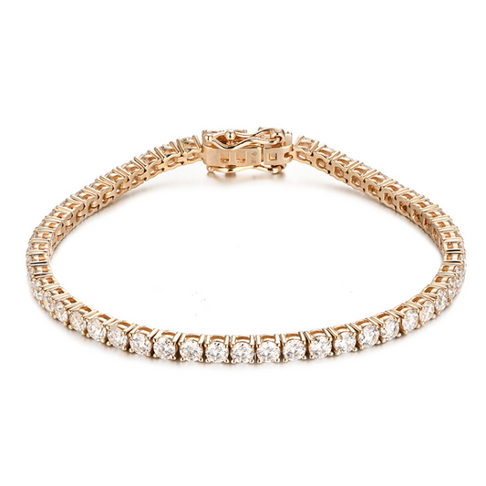 Our stunning Yellow Gold Tennis Bracelet is an elegant bridal, wedding day or everyday piece. This minimalist tennis bracelet can be worn alone or as a stackable bracelet to add to your existing bracelet stack. Diamond SImulant Tennis bracelets 