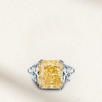 9 Carat fancy yellow radiant cut cocktail ring with silver prong setting, mounted on a sterling silver band, bold statement ring