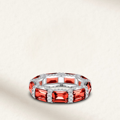 Stackable colored diamond eternity bands with emerald cut and micro pave stones, available in five vibrant colors, u-prong setting, perfect for layering Red