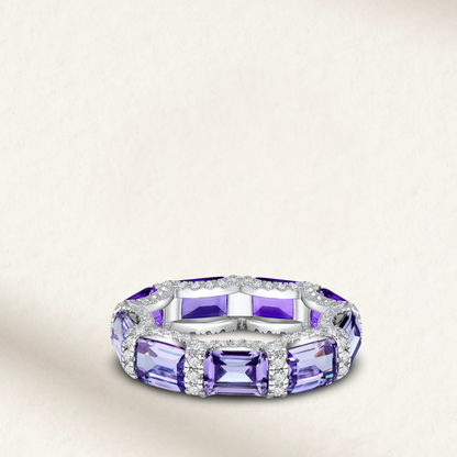 Stackable colored diamond eternity bands with emerald cut and micro pave stones, available in five vibrant colors, u-prong setting, perfect for layering Purple