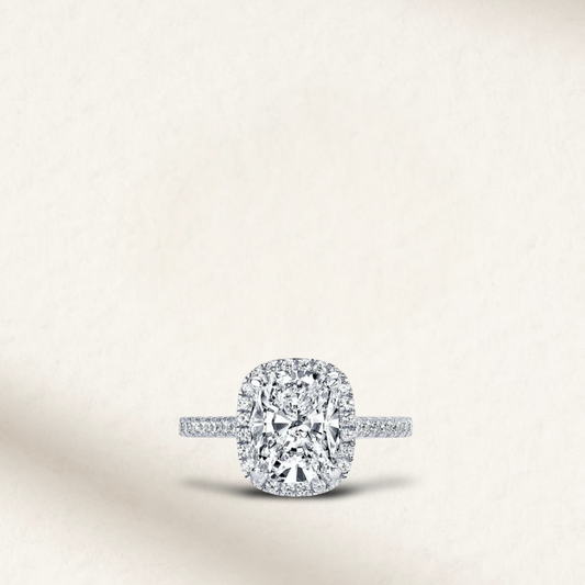 4 Carat cushion cut white brilliant engagement ring with sparkling micro pave halo set in sterling silver, perfect for engagements and special occasions