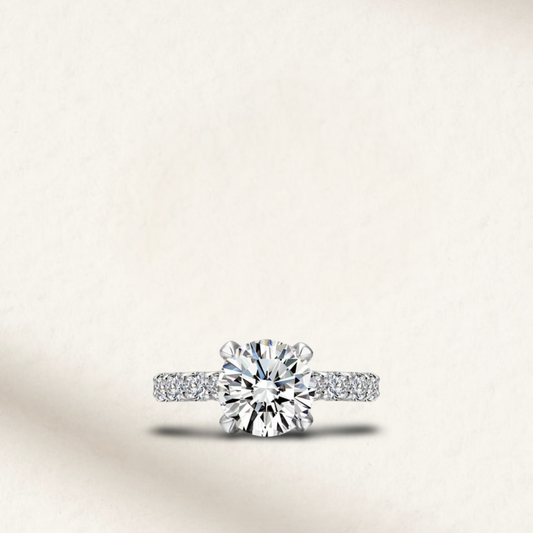3 Carat round cut engagement ring with white brilliant stone, solitaire setting on sterling silver pave band, elegant and timeless bridal jewelry
