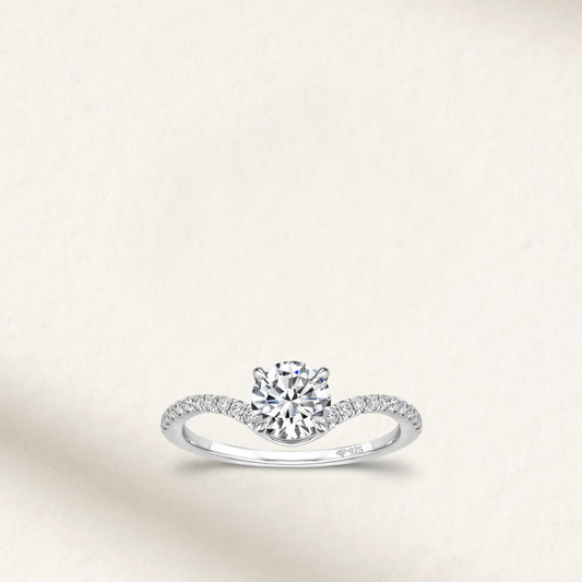 3 Carat round cut solitaire engagement ring with white brilliant stone, prong setting and sterling white gold pave band
