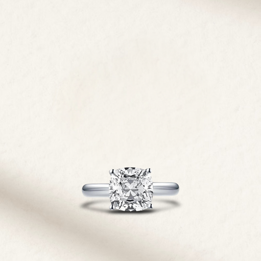 3 Carat cushion cut engagement ring with brilliant white lab-created gemstone in a solitaire setting on a 925 sterling silver band