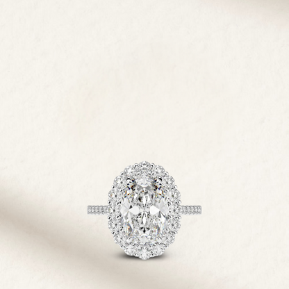 5 Carat white brilliant oval cut engagement ring with side stones in sterling silver
