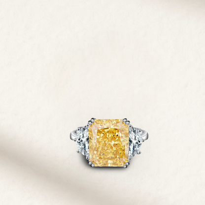 9 Carat canary yellow cushion cut engagement ring set on a polished sterling silver band with vibrant gemstone brilliance