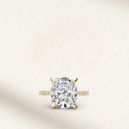6 Carat Cushion Cut Engagement Ring with Hidden Halo in Yellow 
Gold by Margalit Rings – Diamond simulant, bold cushion shape, set in yellow gold with delicate hidden halo detailing, perfect for statement bridal jewelry.