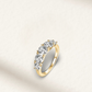 Yellow gold 5 stone eternity ring with 3.6 carats of round brilliant diamond simulants on a polished band.
