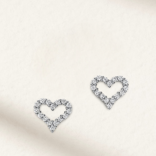 Heart-shaped moissanite bridal earrings in 925 sterling silver, featuring a sparkling and romantic design by Margalit Rings