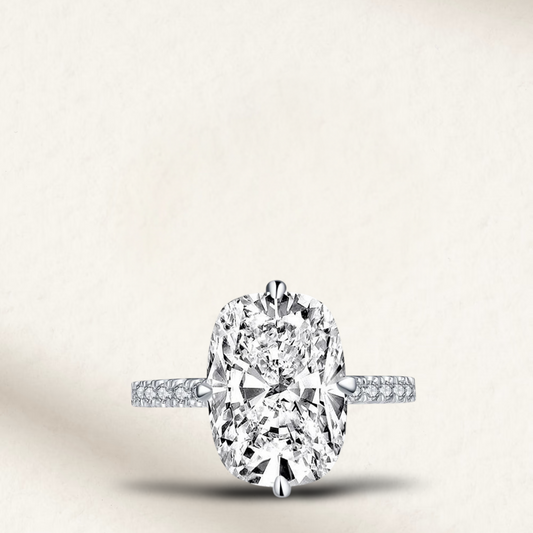 6 carat cushion cut engagement ring with diamond halo set in silver, featuring a bold and elegant design