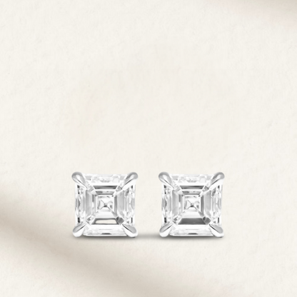2 carat Asscher cut bridal stud earrings set in sterling silver, perfect for elegant wedding day jewelry.