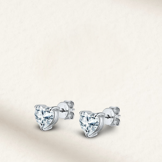 1 carat heart-shaped bridal stud earrings set in sterling silver, romantic and elegant wedding jewelry