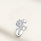 2 carat round cut lab-created engagement ring with D-F color stone set in a classic solitaire 925 sterling silver band.