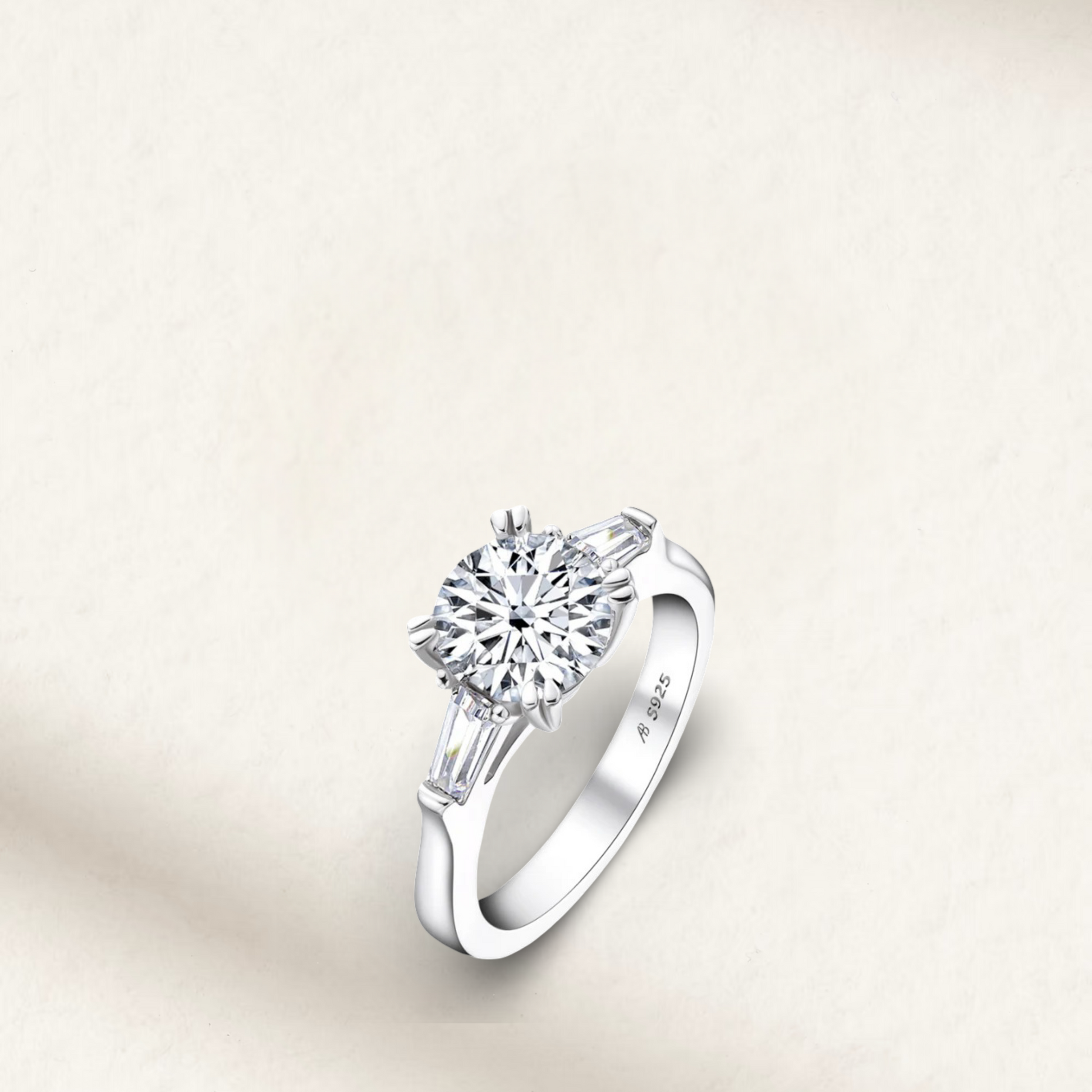 2 carat round cut lab-created engagement ring with D-F color stone set in a classic solitaire 925 sterling silver band.