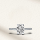2 carat oval cut engagement ring with white brilliant stone, hidden halo, and pavé sterling silver band, perfect for bridal or travel wear.