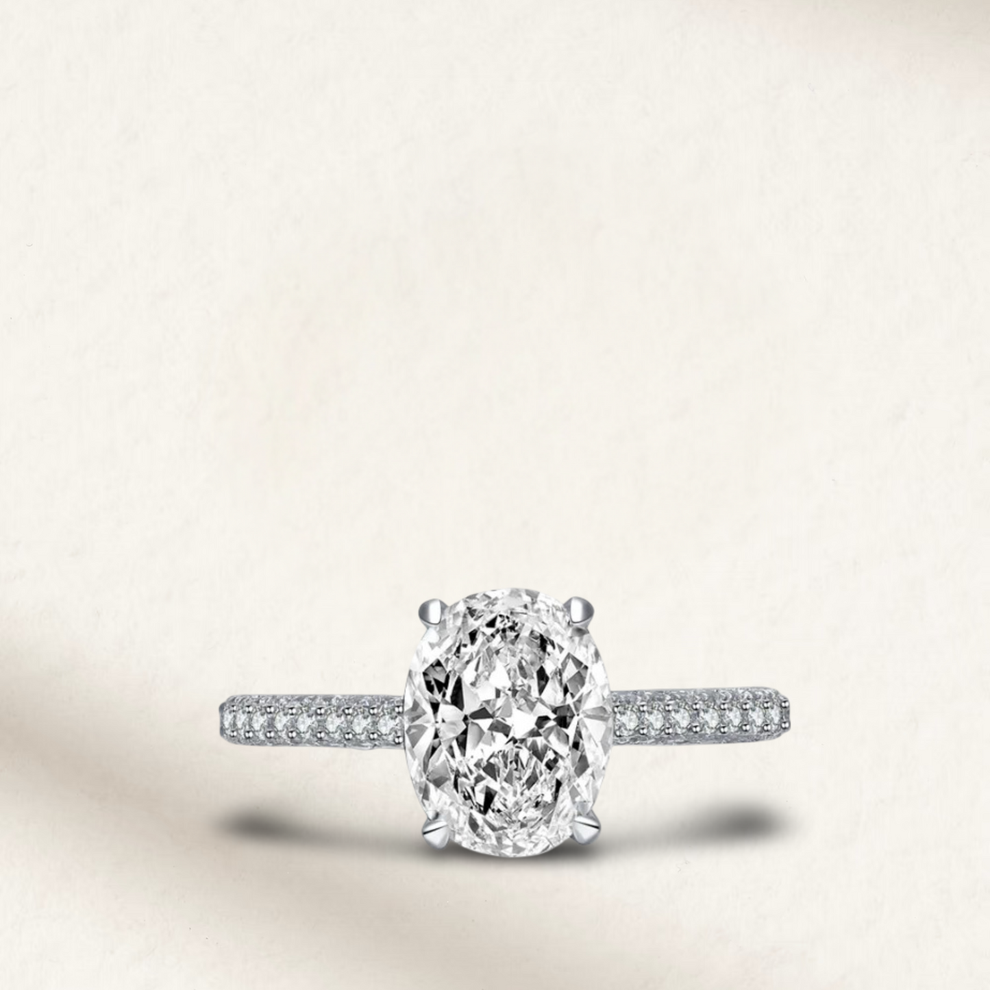 2 carat oval cut engagement ring with white brilliant stone, hidden halo, and pavé sterling silver band, perfect for bridal or travel wear.