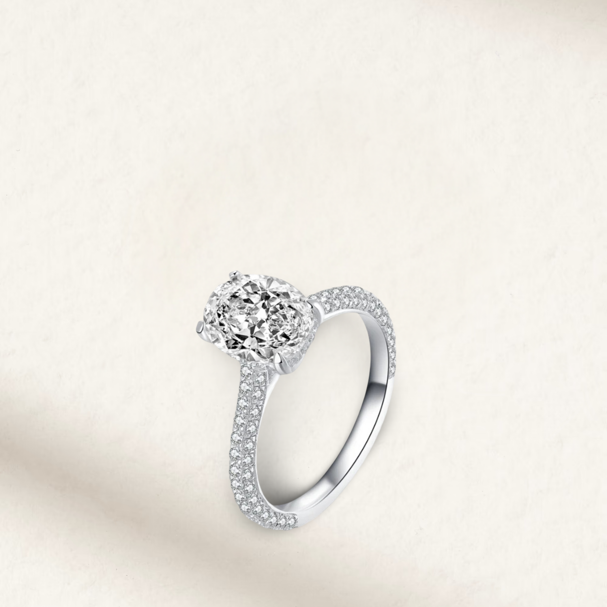2 carat oval cut engagement ring with white brilliant stone, hidden halo, and pavé sterling silver band, perfect for bridal or travel wear.