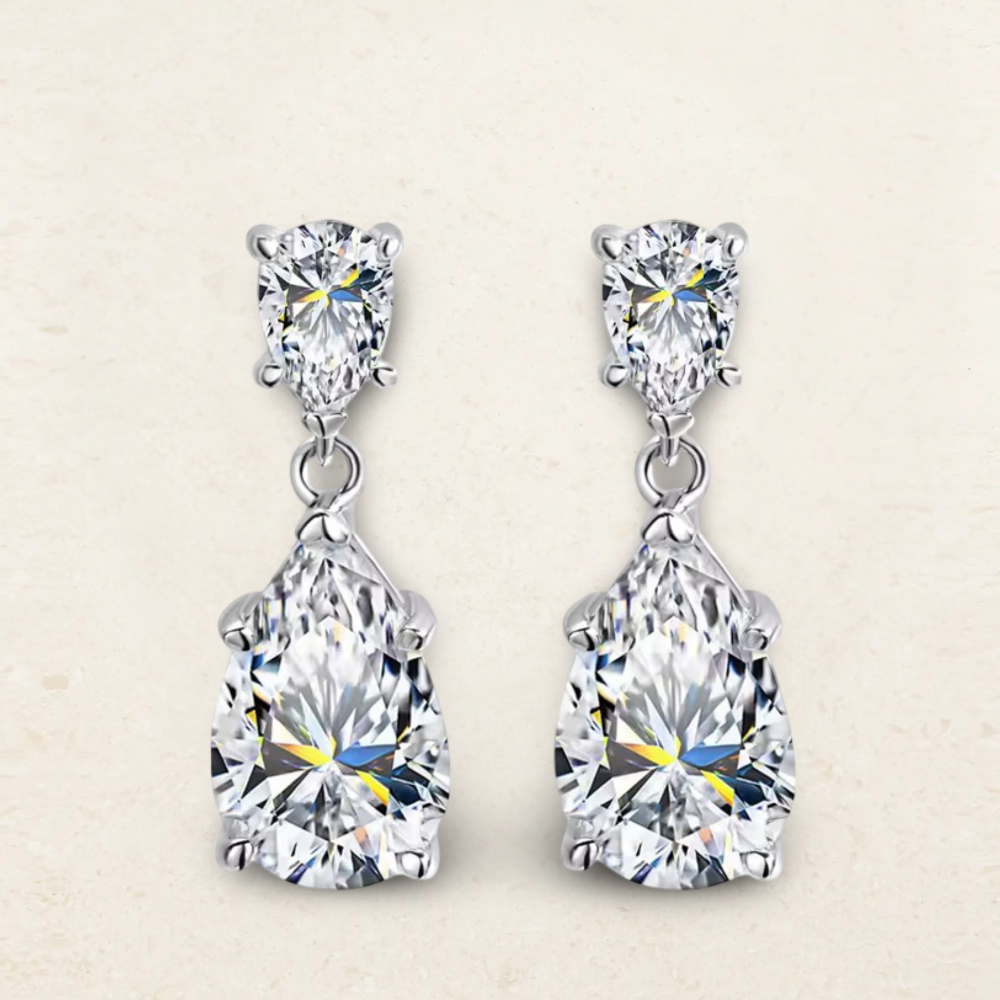 Sofia Richie-inspired pear-shaped waterdrop dangle earrings in a classic bridal design, perfect for weddings and formal occasions.