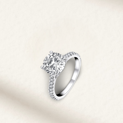 3 Carat round cut engagement ring with brilliant white lab-created gemstone, pavé sterling silver band, also available in rose gold