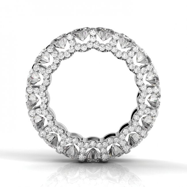 Our classic Round Brilliant Cut Eternity Band with Lab Created Diamonds and U-prong micro pave halo detail around each stone for maximum sparkle and shine on a 925 Silver Band by Margalit rings side view
