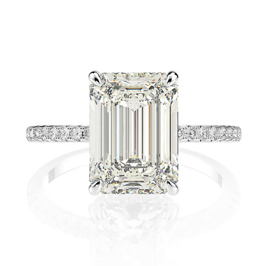 Nicola Peltz Engagement Ring from Brooklyn Beckham Exceptional 3.5 Carat Emerald Cut Diamond Ring with a hidden halo of diamonds, on a micro pave band, is perfect for proposals, engagement rings, or as a promise rings by Margalit Rings