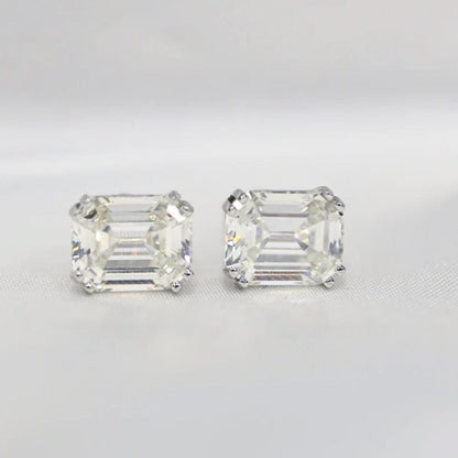 Our timeless, Emerald cut, sterling silver studs weighing 3 carats each, 8mm x 10mm stones. Our beautiful earrings are an elegant option for bridal jewellery or a special anniversary gift! Boxed and ready to go, these diamond earrings enhance any outfit front view by Margalit Rings